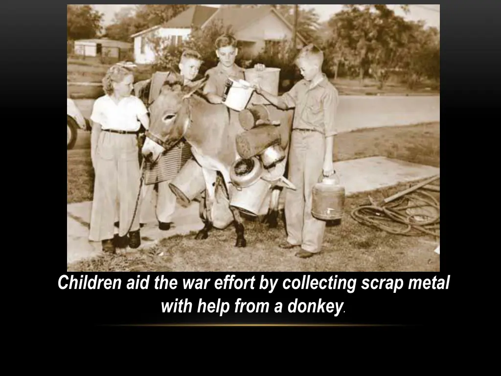 children aid the war effort by collecting scrap