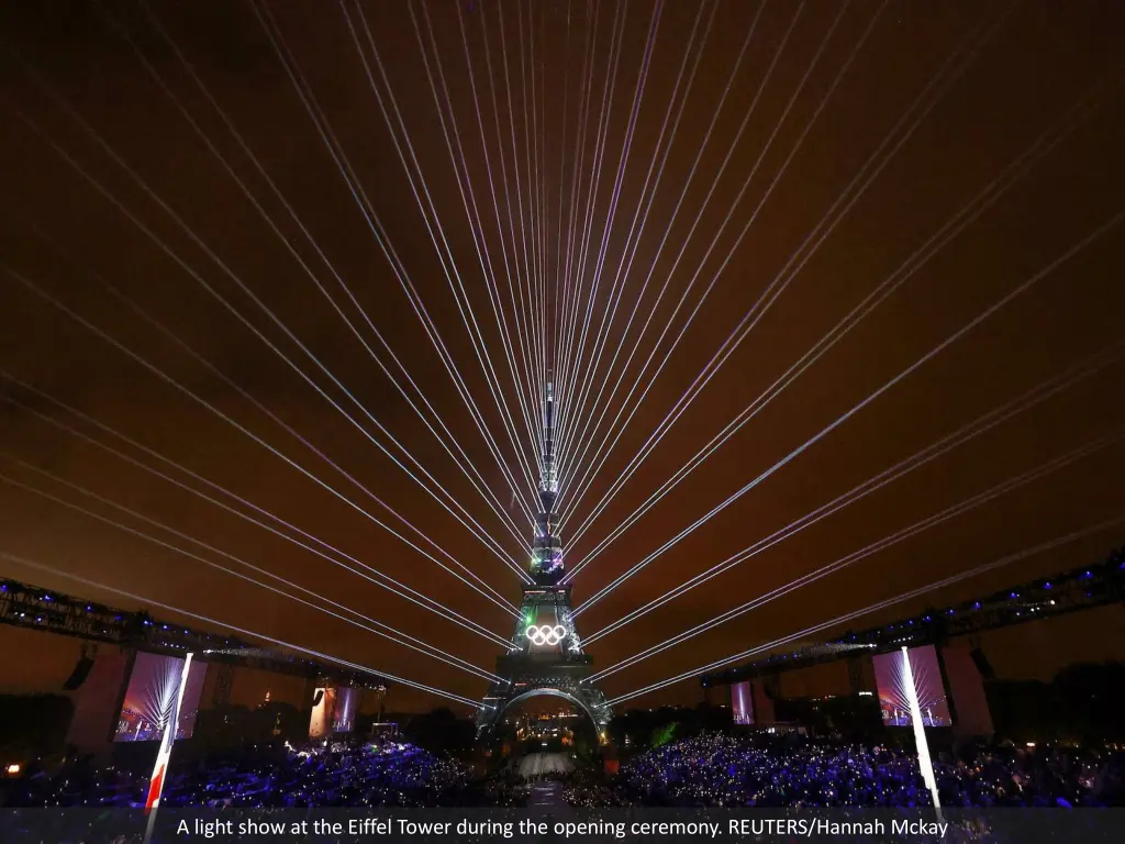 a light show at the eiffel tower during