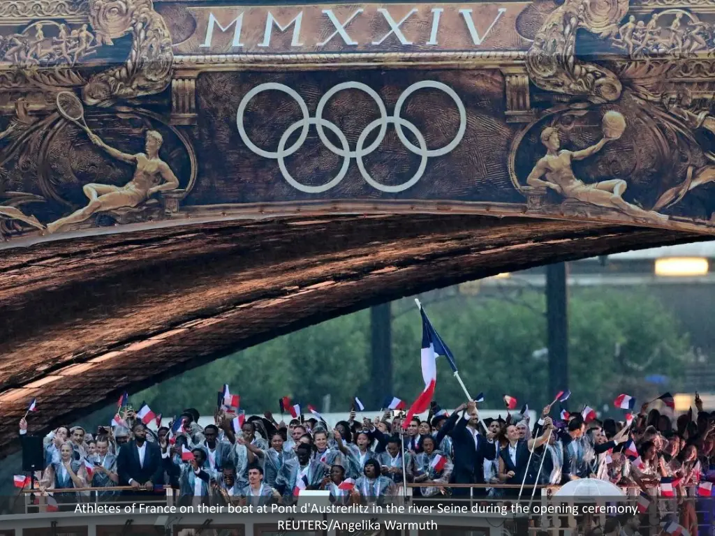 athletes of france on their boat at pont