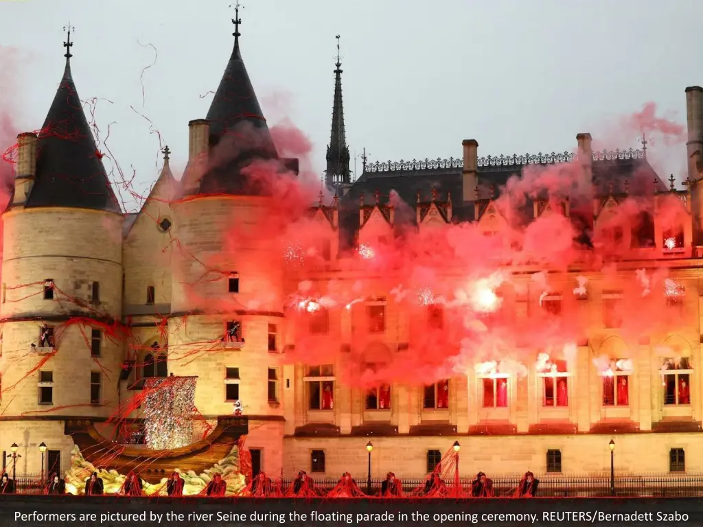 performers are pictured by the river seine during