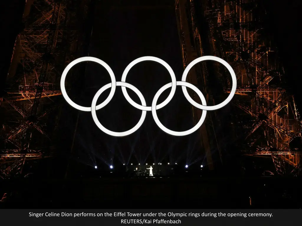 singer celine dion performs on the eiffel tower