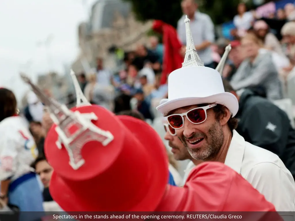 spectators in the stands ahead of the opening