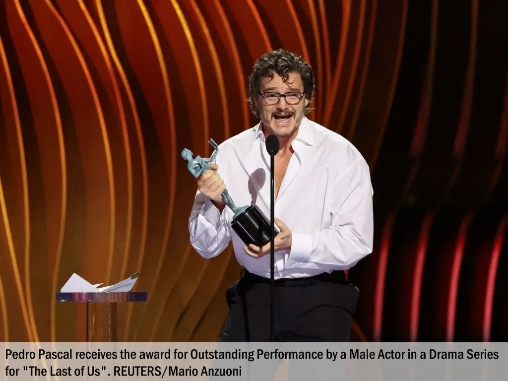 pedro pascal receives the award for outstanding