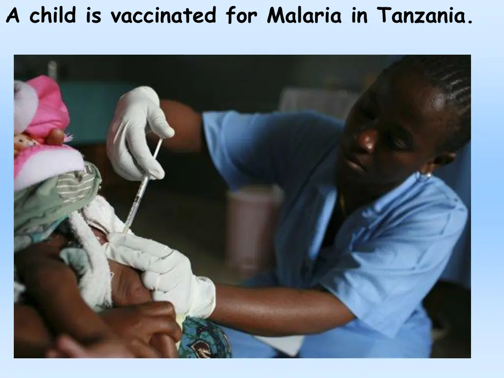 a child is vaccinated for malaria in tanzania