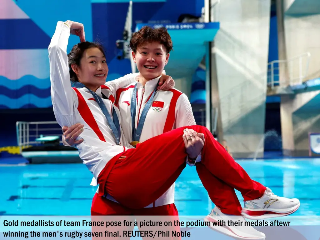 gold medallists of team france pose for a picture