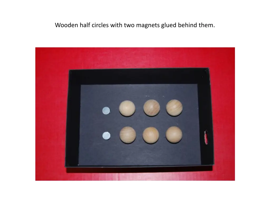 wooden half circles with two magnets glued behind