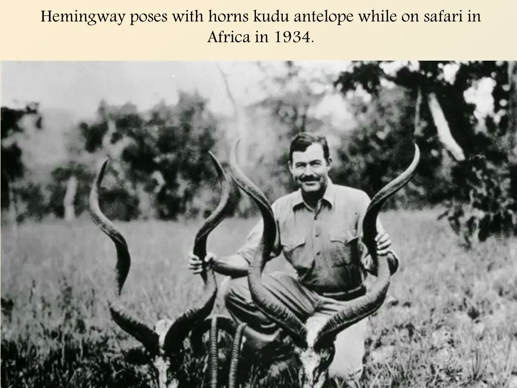 hemingway poses with horns kudu antelope while