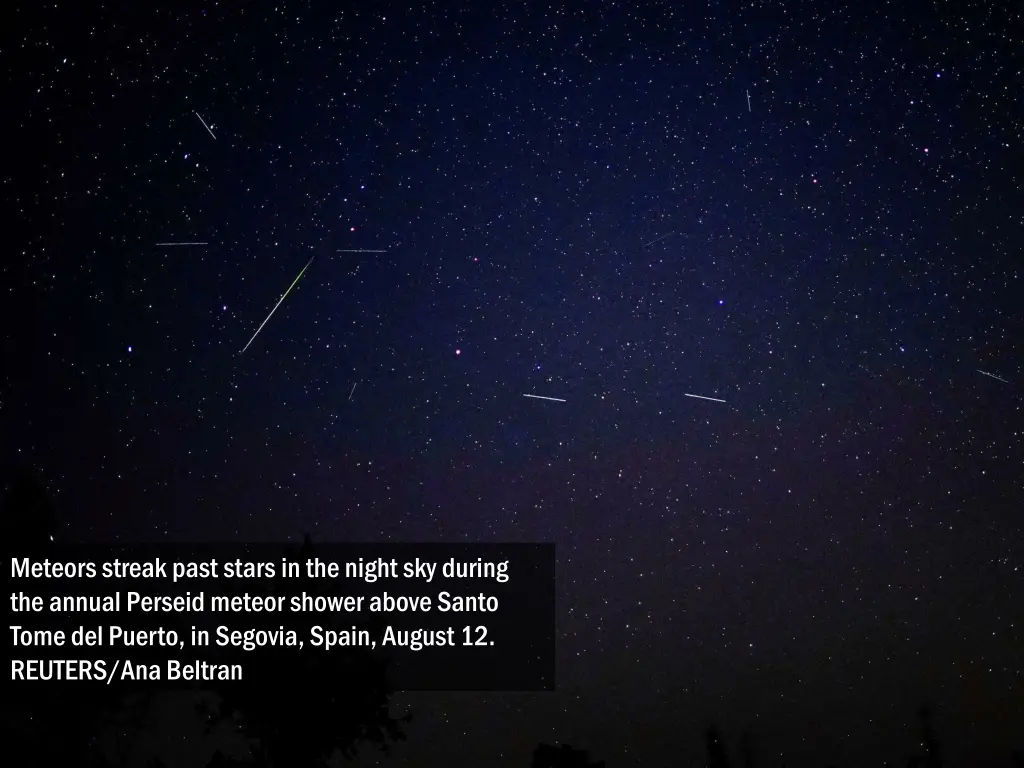 meteors streak past stars in the night sky during 2