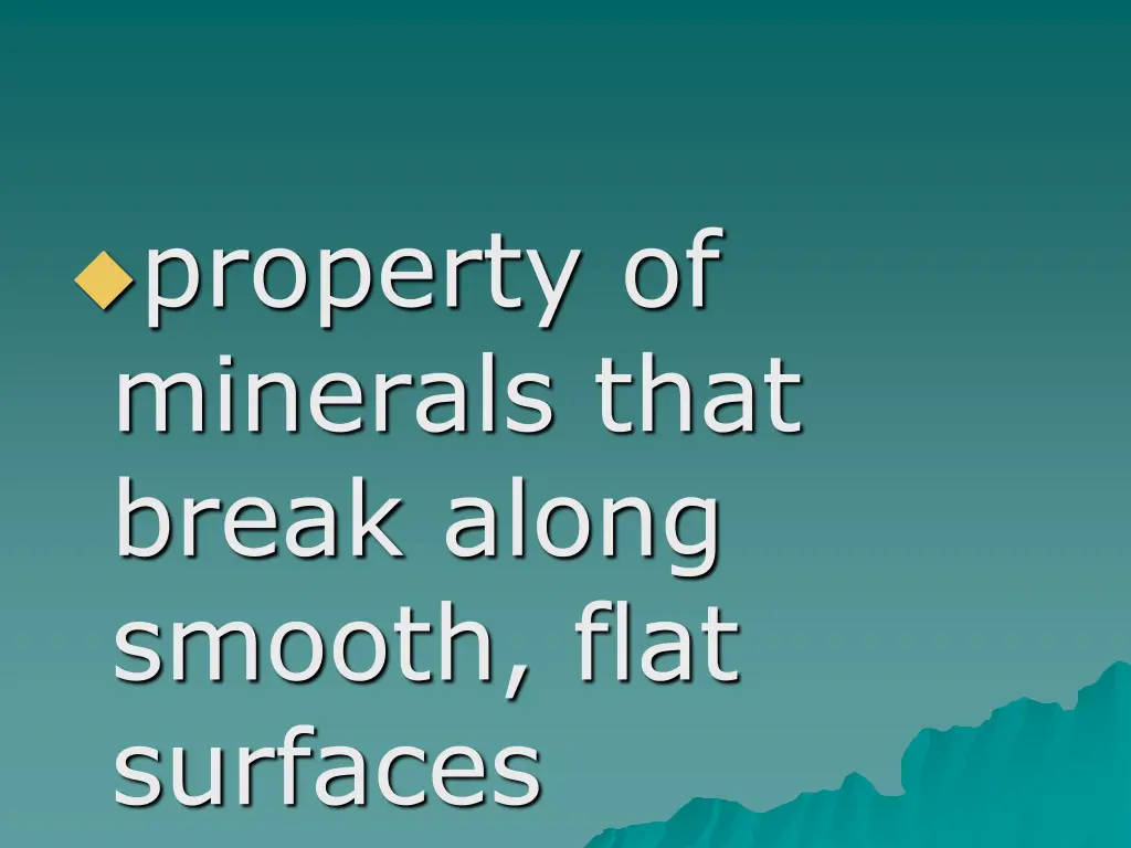 property of minerals that break along smooth flat