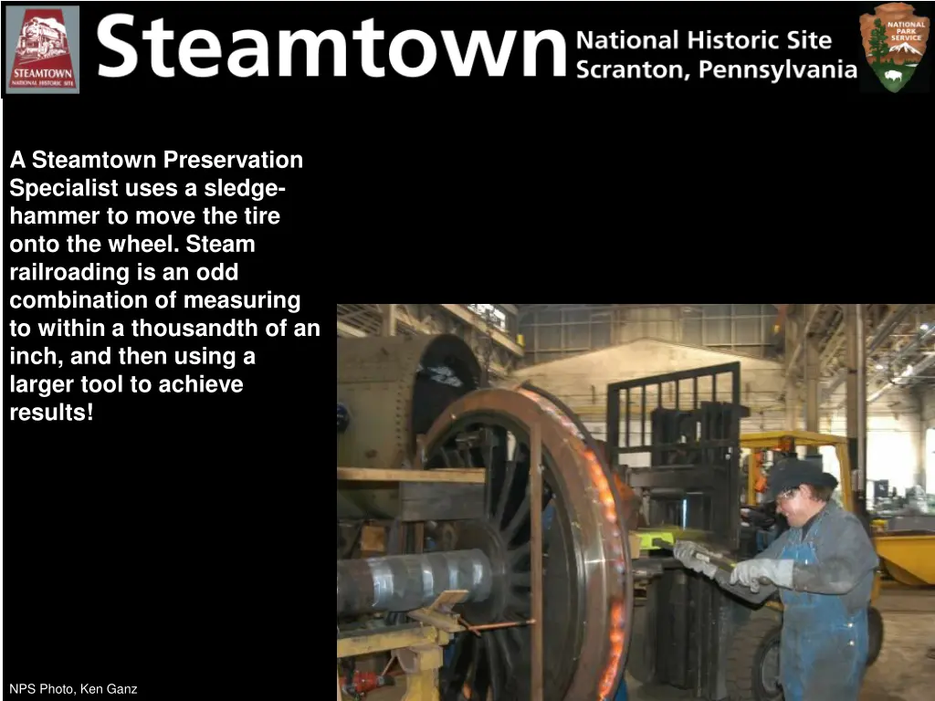 a steamtown preservation specialist uses a sledge