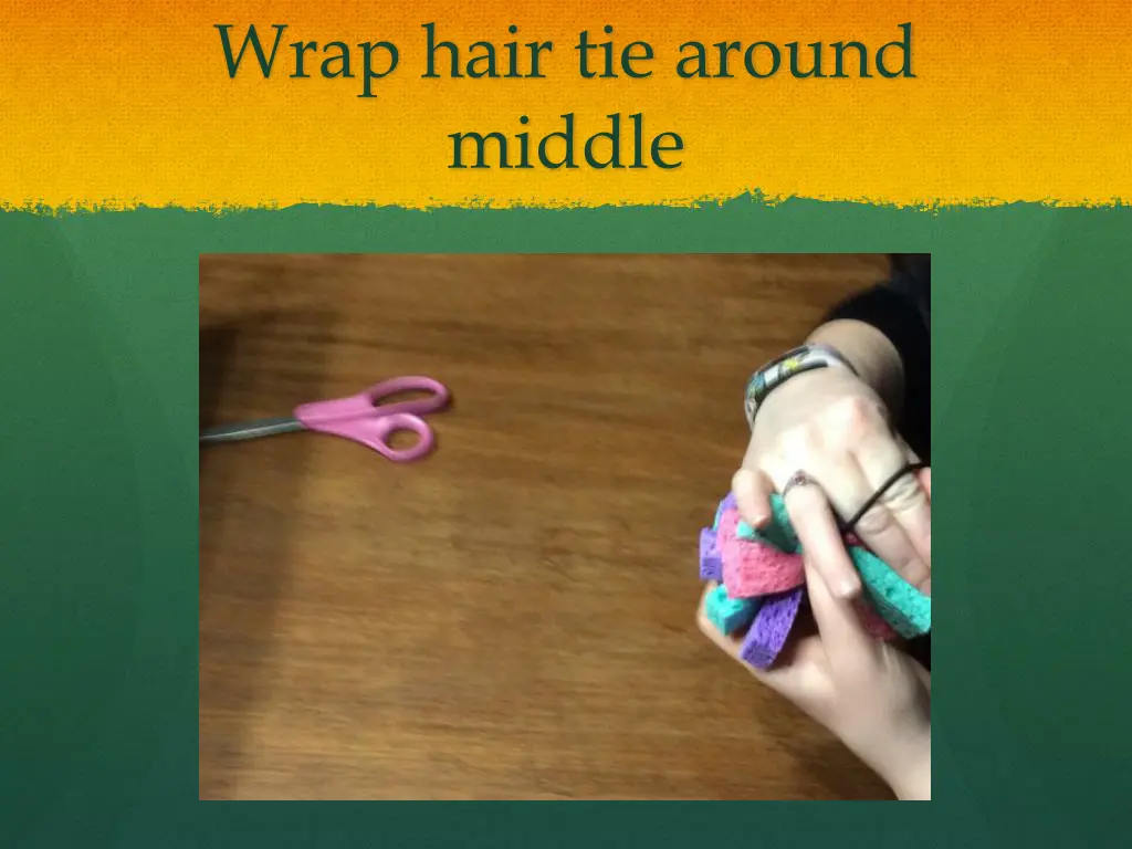 wrap hair tie around middle