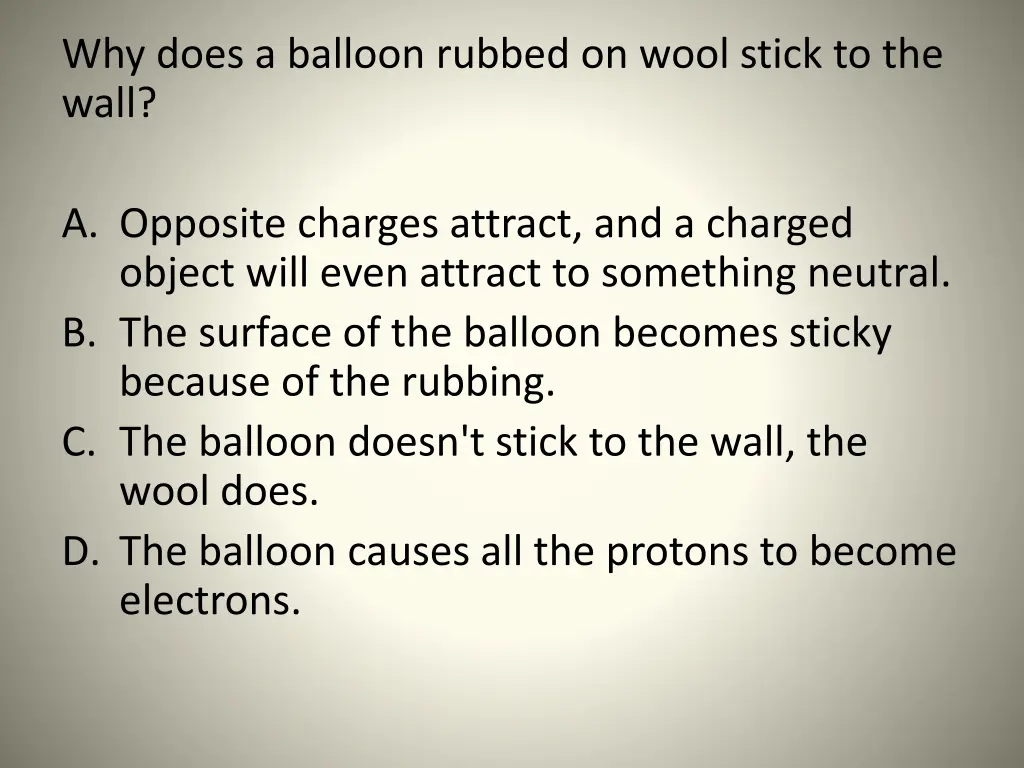 why does a balloon rubbed on wool stick