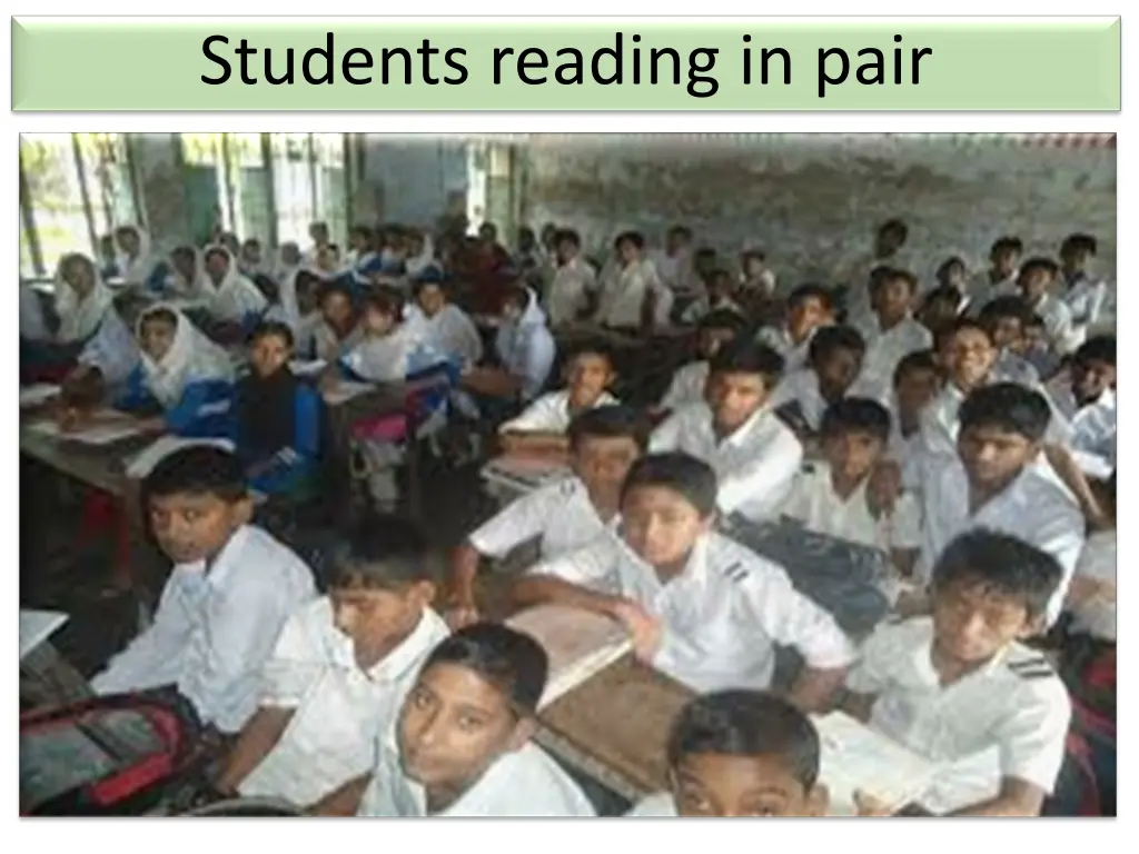 students reading in pair