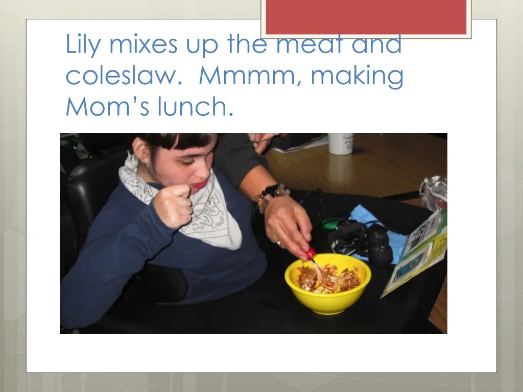 lily mixes up the meat and coleslaw mmmm making