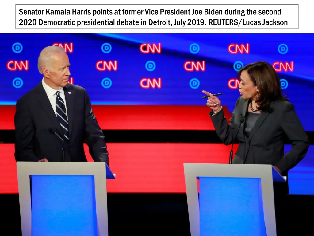 senator kamala harris points at former vice