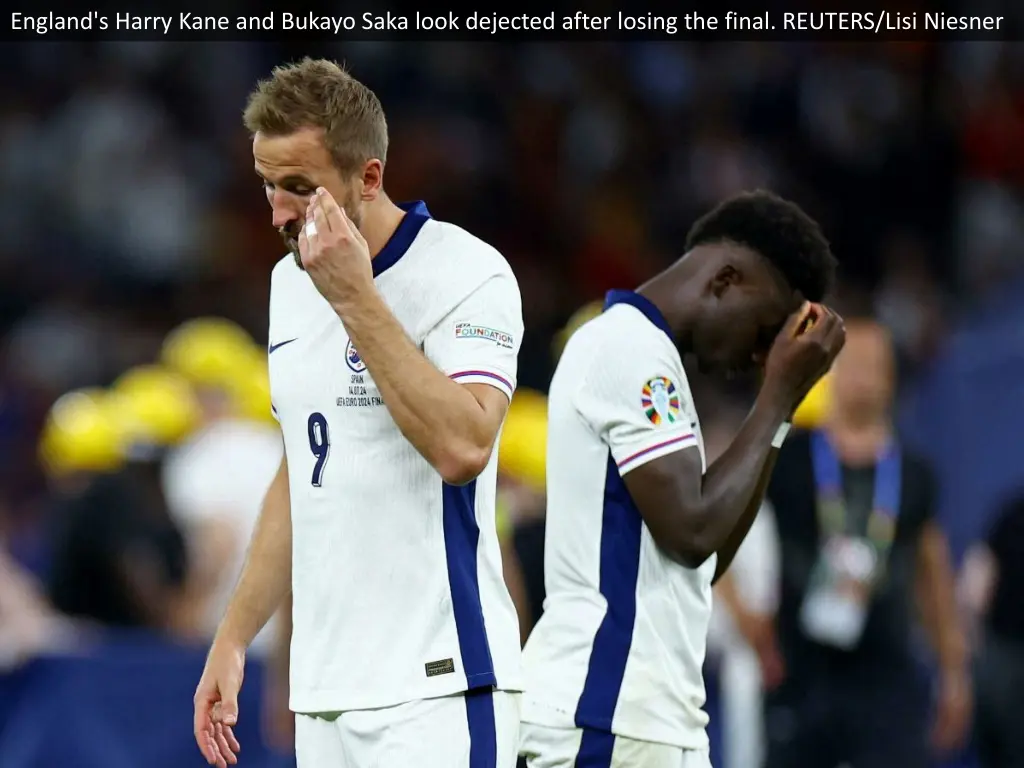 england s harry kane and bukayo saka look