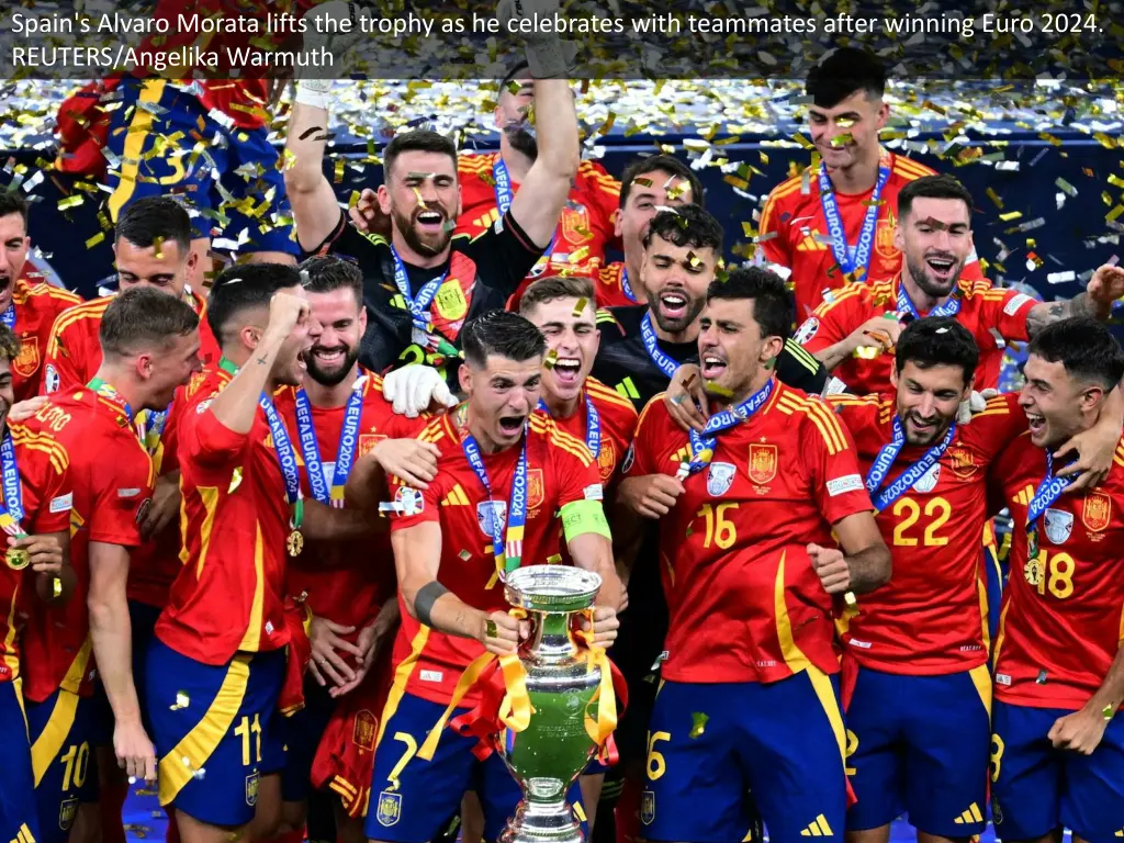 spain s alvaro morata lifts the trophy