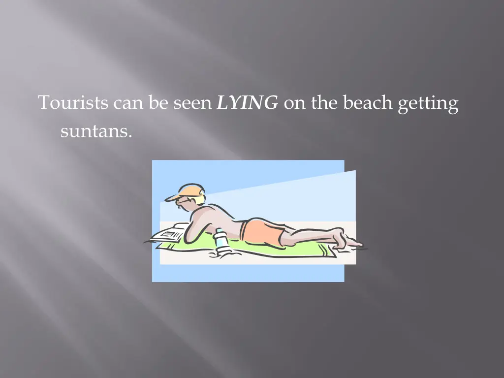 tourists can be seen lying on the beach getting