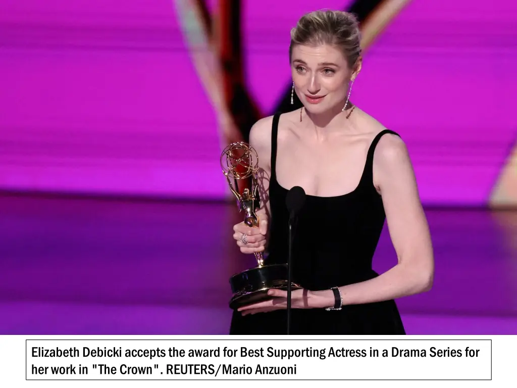 elizabeth debicki accepts the award for best