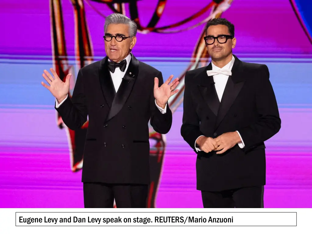 eugene levy and dan levy speak on stage reuters