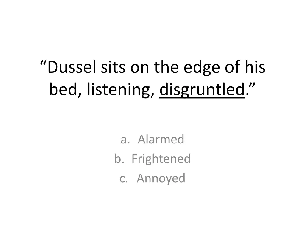 dussel sits on the edge of his bed listening