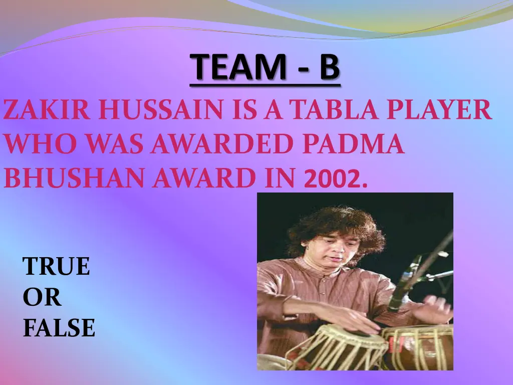 zakir hussain is a tabla player who was awarded