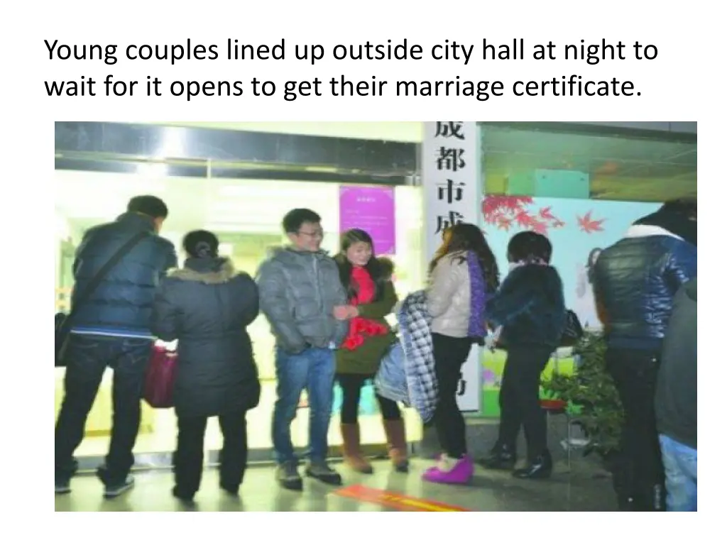 young couples lined up outside city hall at night