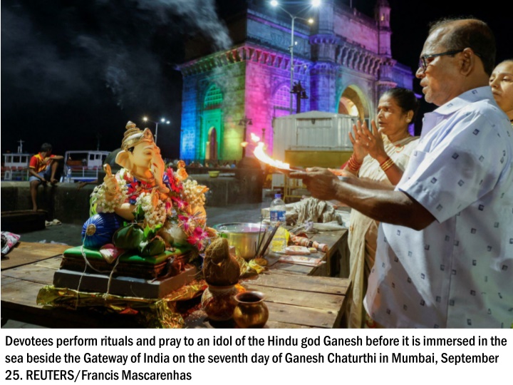 devotees perform rituals and pray to an idol