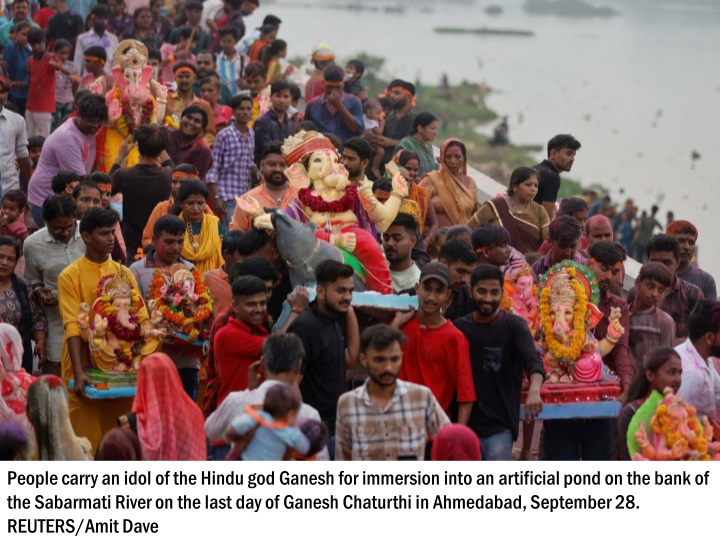 people carry an idol of the hindu god ganesh 2