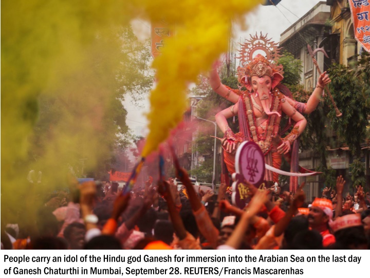 people carry an idol of the hindu god ganesh 4