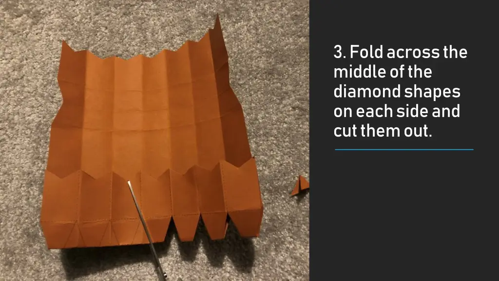 3 fold across the middle of the diamond shapes