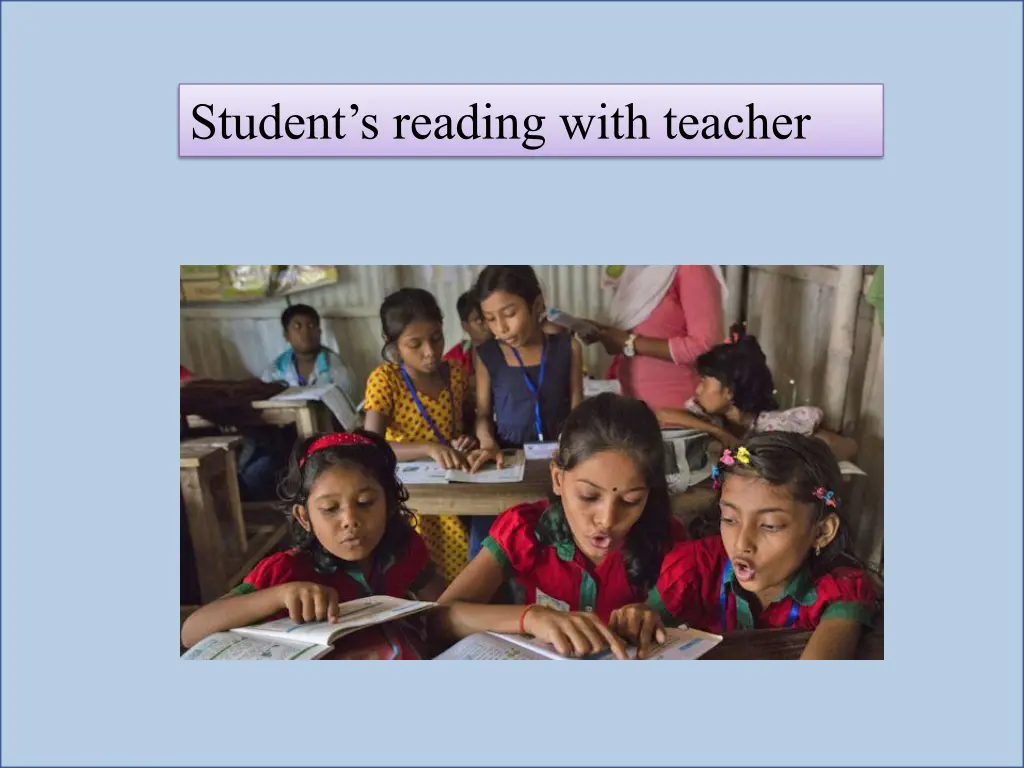 student s reading with teacher