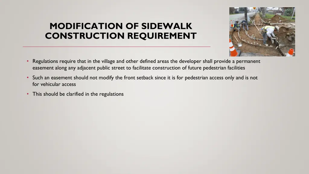 modification of sidewalk construction requirement