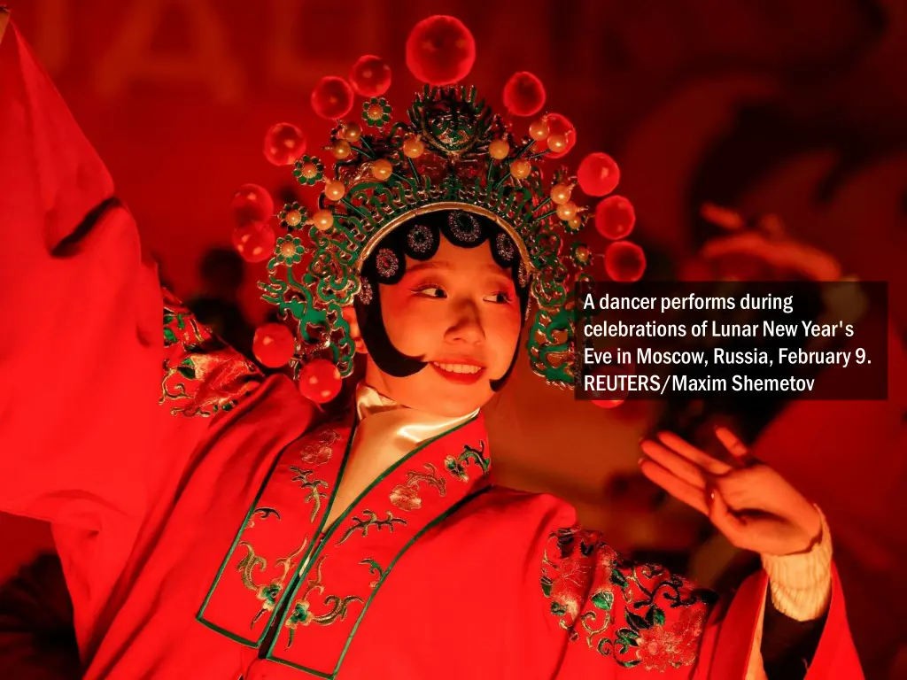 a dancer performs during celebrations of lunar