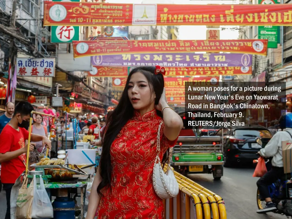 a woman poses for a picture during lunar new year