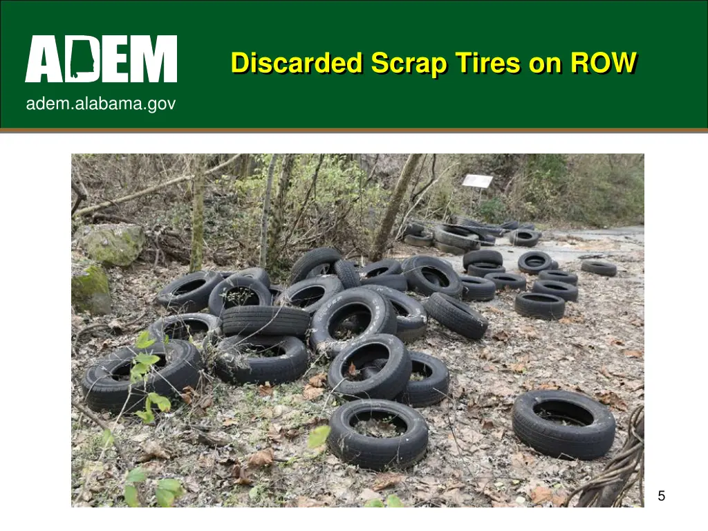 discarded scrap tires on row