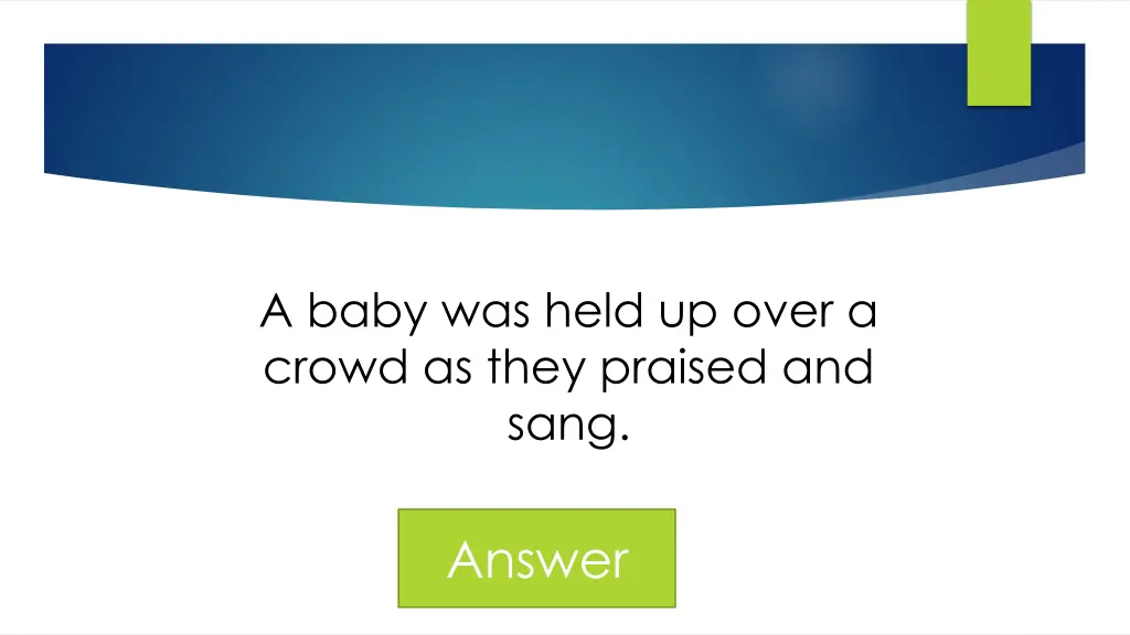 a baby was held up over a crowd as they praised