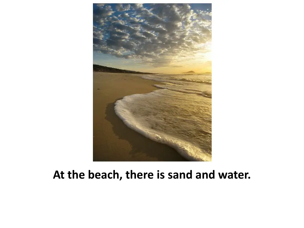 at the beach there is sand and water