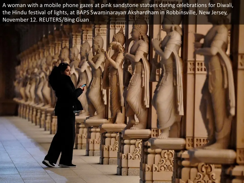 a woman with a mobile phone gazes at pink