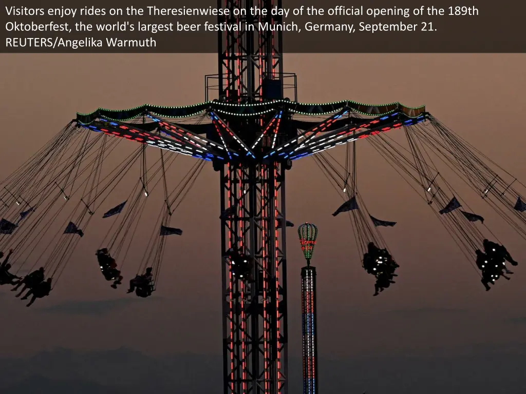 visitors enjoy rides on the theresienwiese