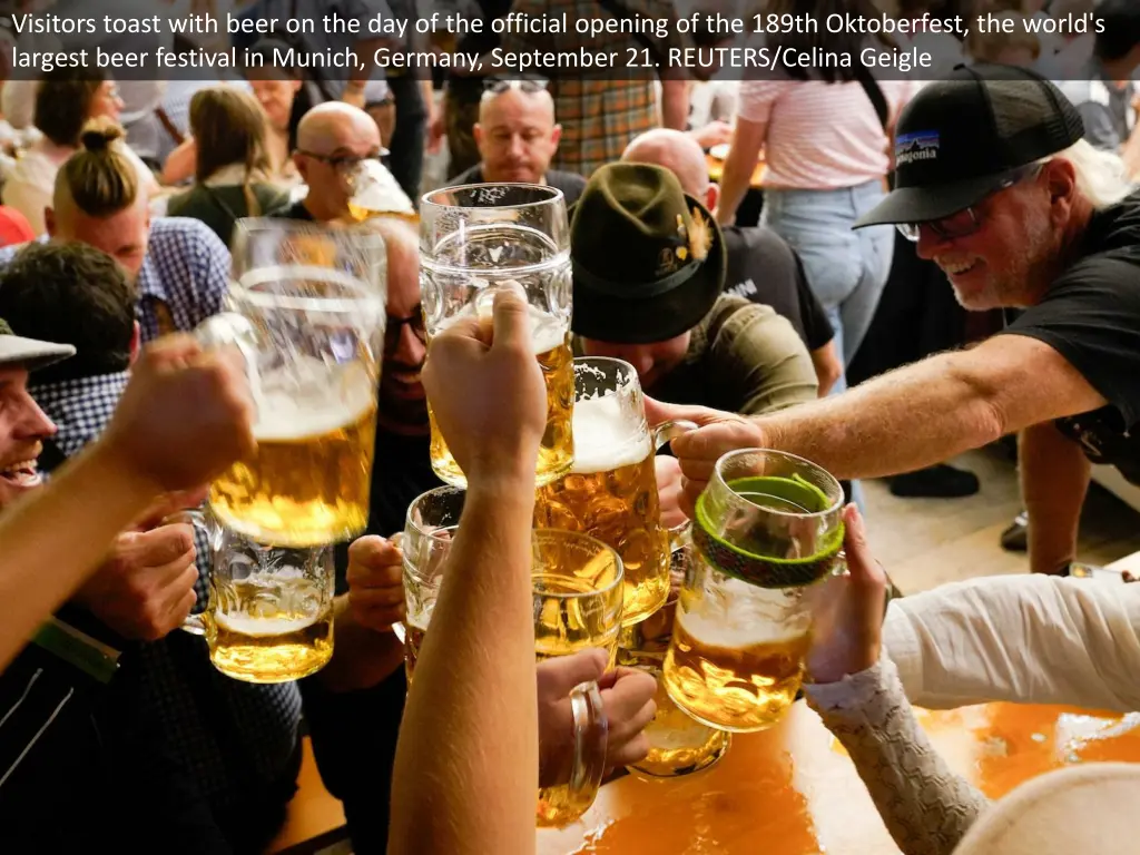 visitors toast with beer