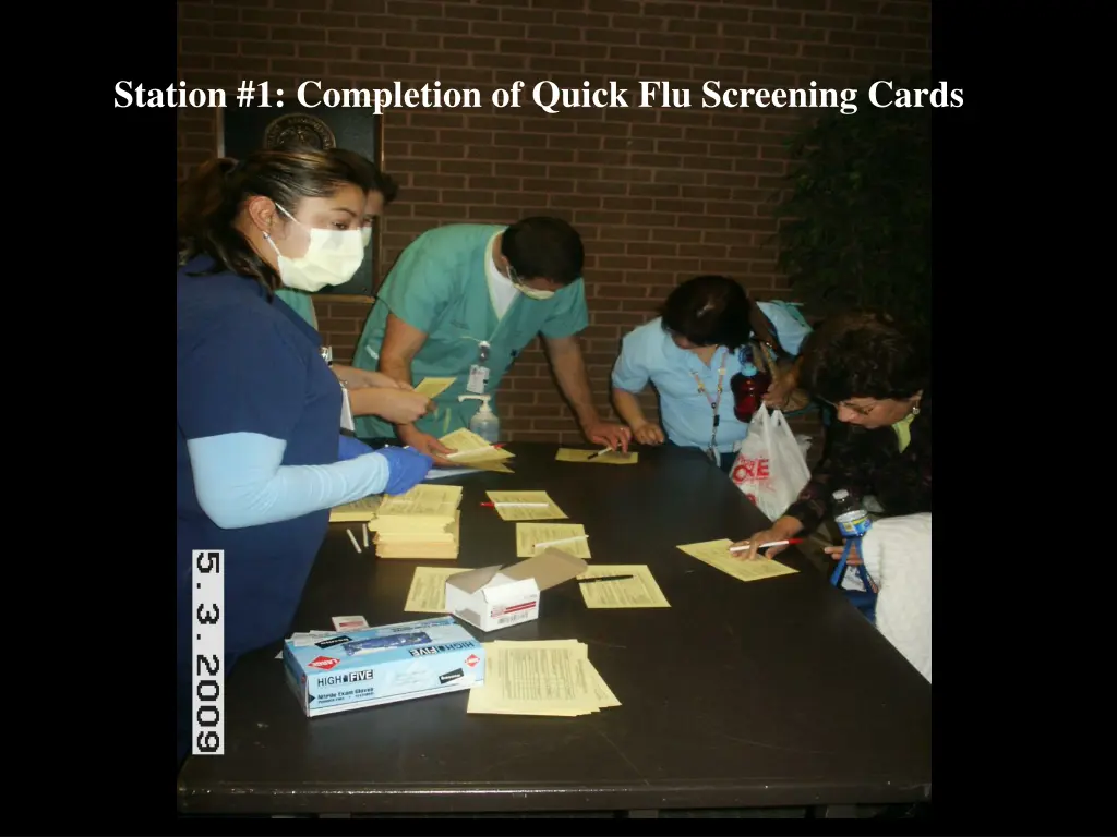 station 1 completion of quick flu screening cards