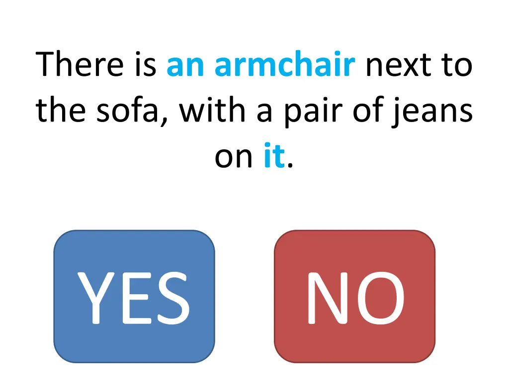 there is an armchair next to the sofa with a pair