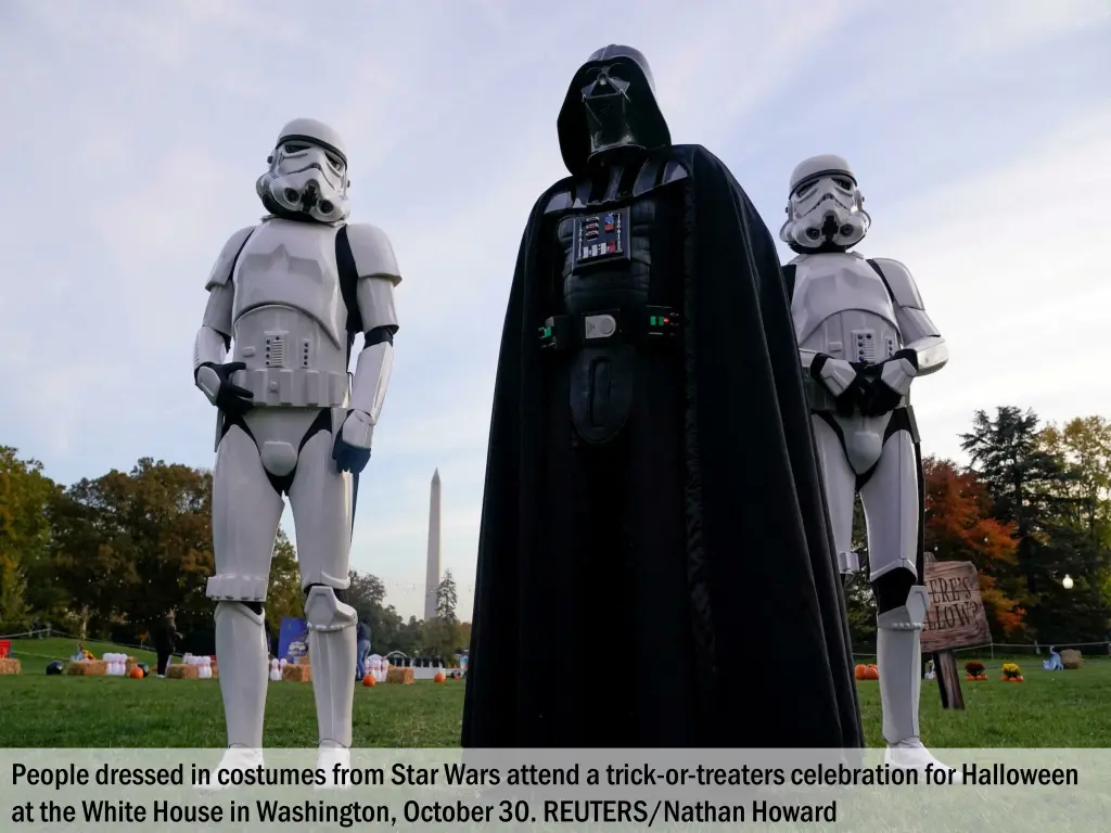 people dressed in costumes from star wars attend