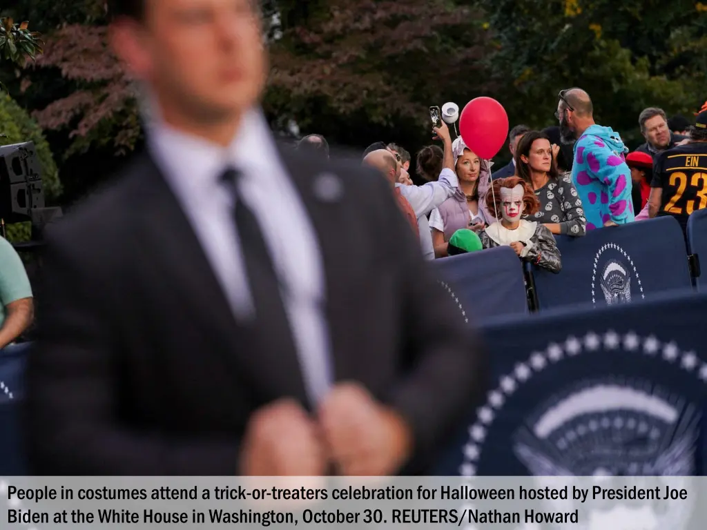 people in costumes attend a trick or treaters