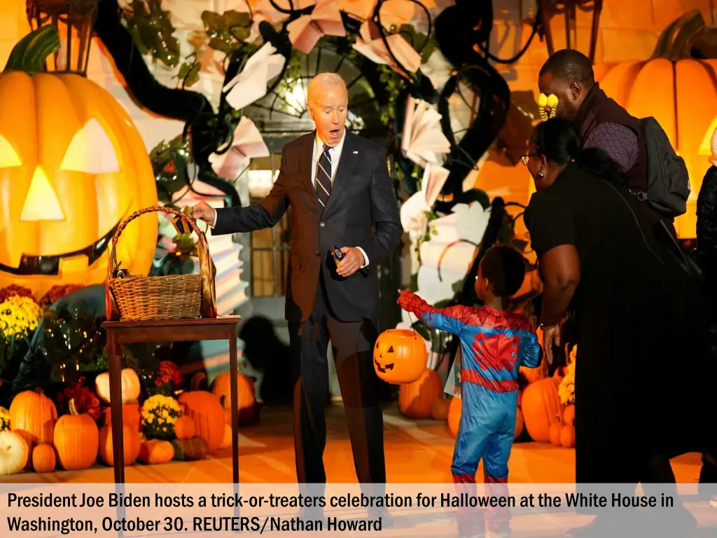 president joe biden hosts a trick or treaters