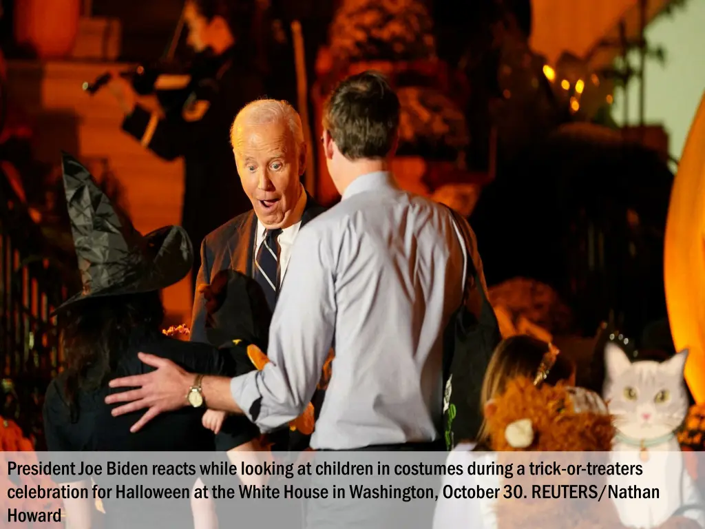 president joe biden reacts while looking 1