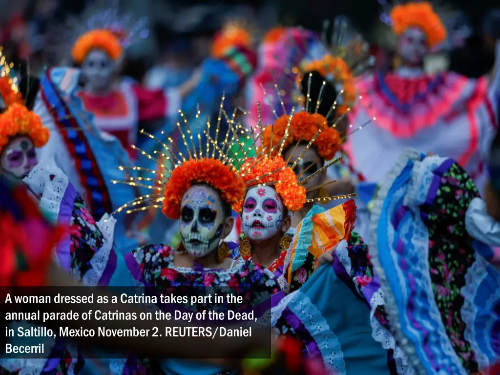 a woman dressed as a catrina takes part 1