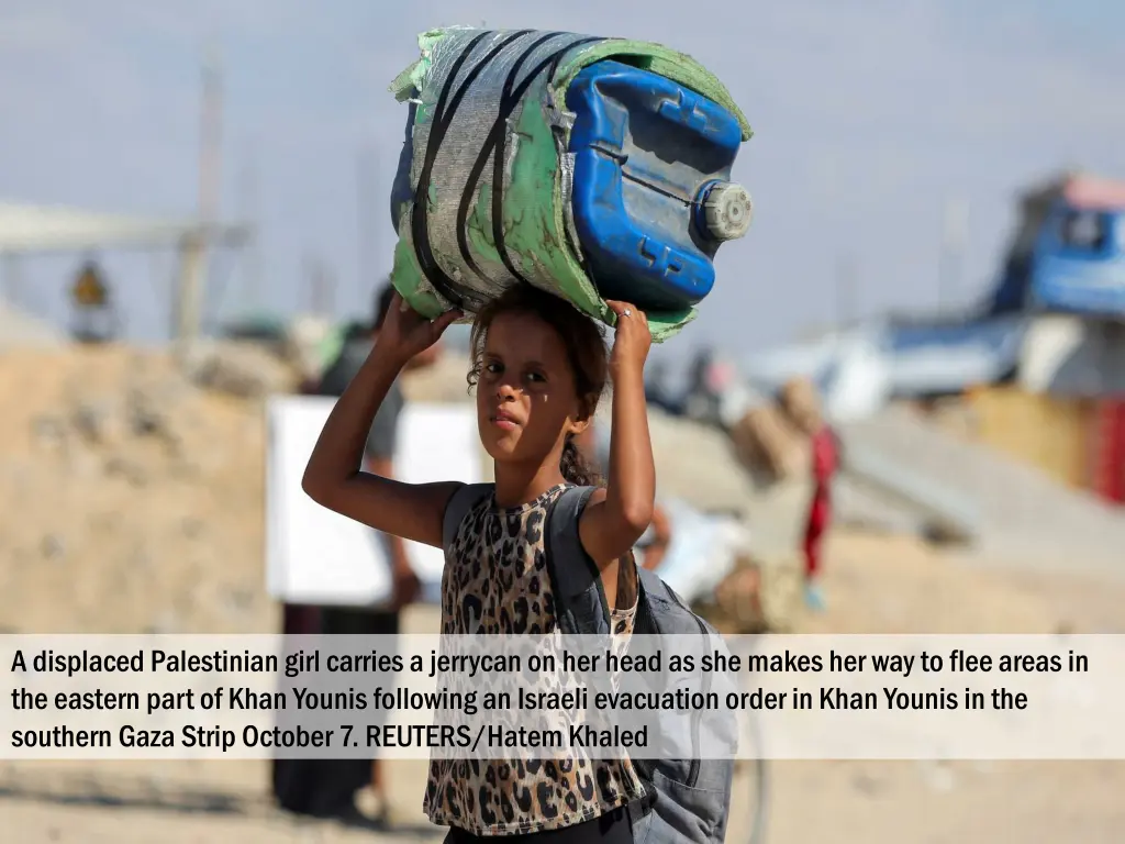 a displaced palestinian girl carries a jerrycan