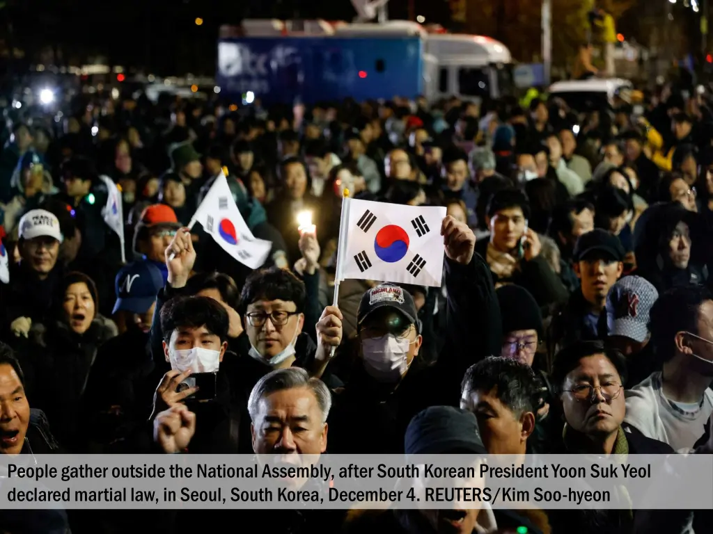 people gather outside the national assembly after